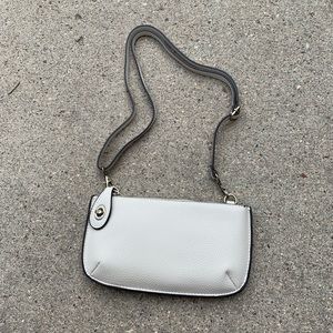 Locking crossbody purse